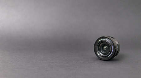 Camera lens on black background
