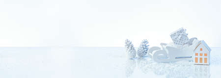 A table with white Christmas decorations under the lights against a white backgroundの写真素材