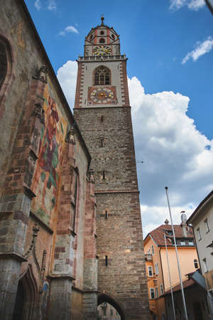 A vertical low angle shot of a historical building in the Arcaded Street in Merano  Italy