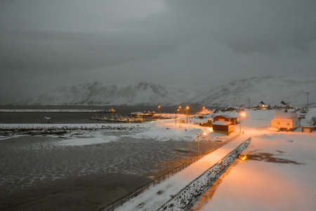A marvelous magical scenery of a neighborhood full of lights in Skarsvag, Norway