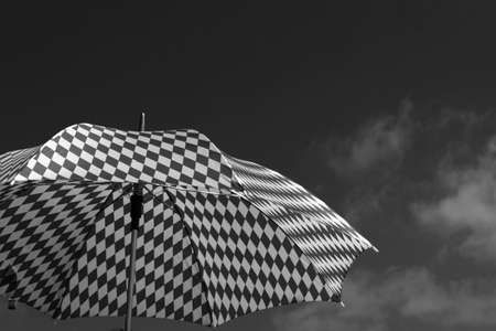 Umbrella against the sky in Black and Whiteの写真素材
