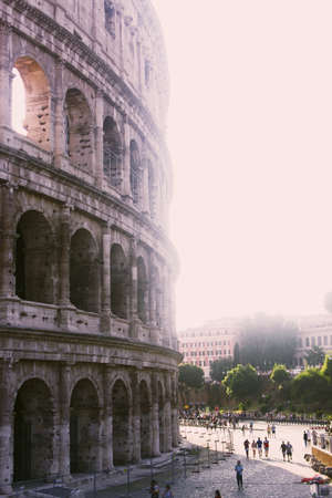 A vertical shot of the great Roman Coliseum on a sunny day