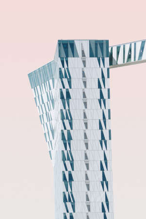 A vertical shot of an exotic structure on a pink backgroundの写真素材