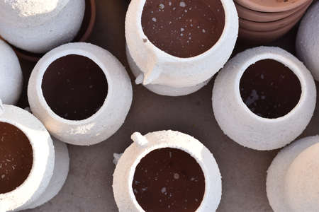 ceramic jars and plates in ceramics workshop