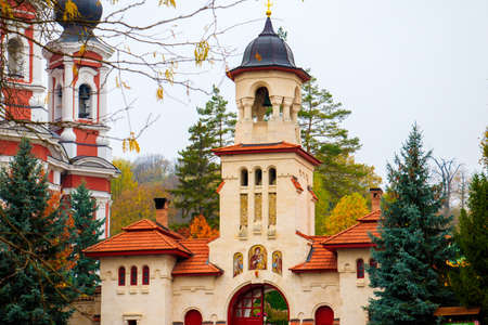 A low angle shot of the central tower of the famous Curchi Monastery in Moldovaの写真素材