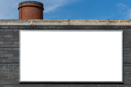 A closeup shot of a whiteboard at a brick wall with copy space for contentの写真素材