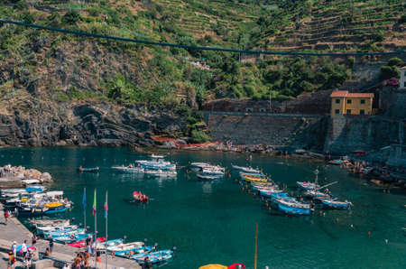 CINQUE TERRE, ITALY - Aug 10, 2018: Boats and sea at Five Earth in Italy.のeditorial素材