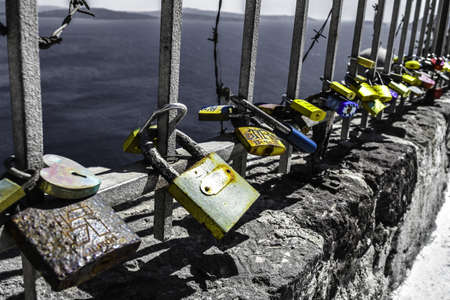 love locks on a fence in Santoriniのeditorial素材
