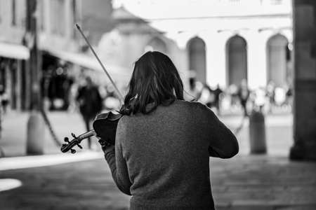 BERGAMO, ITALY - Feb 01, 2019: People, things, animal, in the street around CittÃ  Alta, Bergamoのeditorial素材