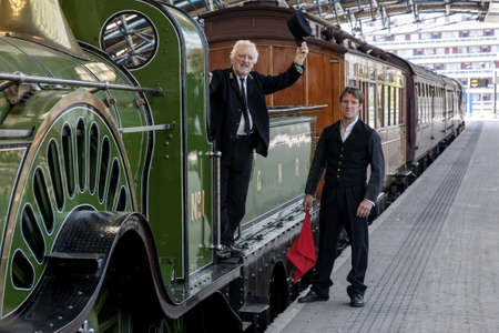 LONDON, UNITED KINGDOM - Jun 03, 2010: Bernard Cribbins and Marshall Lancaster on the set of The Railway Children, Waterloo Stationのeditorial素材