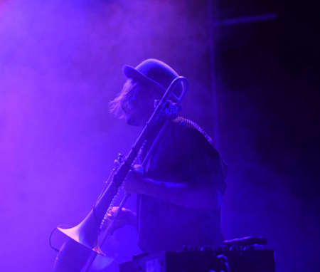 BATH, ENGLAND, UNITED KINGDOM - May 19, 2017: Dub fusion band The Maitree Express in performance at Komedia, Bath, England, during the opening night of the Bath arts festival. 19 May 2017.のeditorial素材