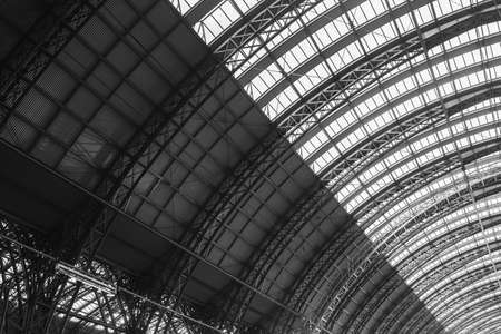 A greyscale of the Central Railway Station under sunlight in Frankfurt in Germany