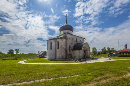 A landscape shot of the white Dmitrievskiy temple in Yuryev-Polsky city, Russia, during daytimeのeditorial素材