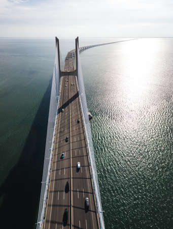 LISBON, PORTUGAL - Mar 01, 2019: Aerial view of the Vasco da Gama Bridge in a sunny and clear day, Lisbon, Portugalのeditorial素材