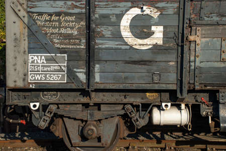 DIDCOT, UNITED KINGDOM - Feb 17, 2008: Graphics on the side of an old steam train carriage at Didcot Steam Train Centre, Oxfordshire, UKのeditorial素材