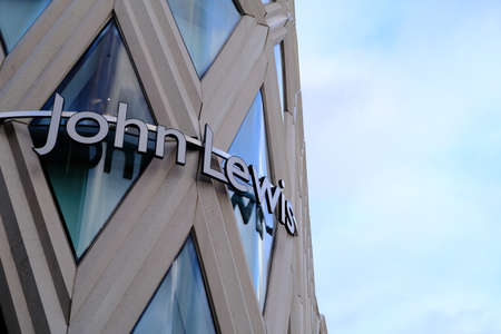 LEEDS, UNITED KINGDOM - Jan 04, 2020: Leeds John Lewis stoke sign on side of building on a clouding January dayのeditorial素材