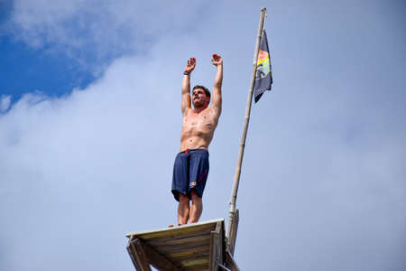 NEGRIL, JAMAICA - Aug 05, 2016: Ricks CafÃ©, Negril, Jamaica â August 2016: David Colturi Red bull cliff diver jumping off platformのeditorial素材