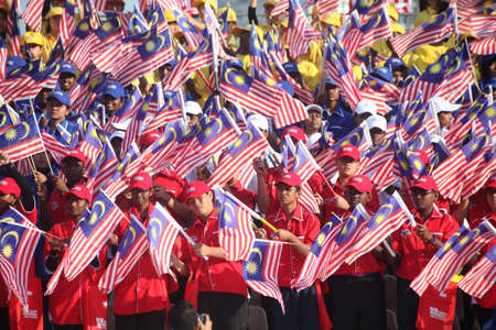 KUALA LUMPUR, MALAYSIA - Aug 31, 2012: A group of Malaysians celebrate national day and independence.のeditorial素材