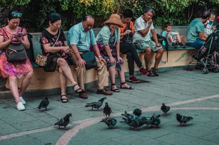 CINQUE TERRE, ITALY - Aug 10, 2018: Japanese people and birds at five earth in Italyのeditorial素材