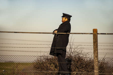 DIDCOT, UNITED KINGDOM - Feb 17, 2008: Steam train enthusiast acts as porter at the Didcot Steam...