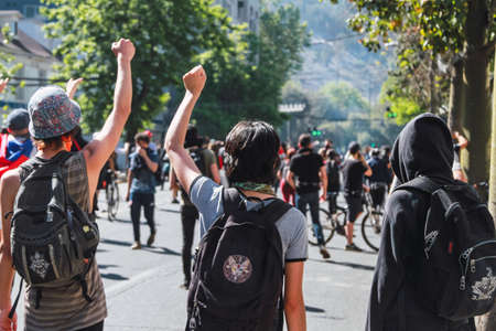 SANTIAGO, CHILE - Nov 28, 2019: The protests show their dissatisfaction with the Chilean government due to the social crisis that plagues President PiÃ±era and Chileのeditorial素材