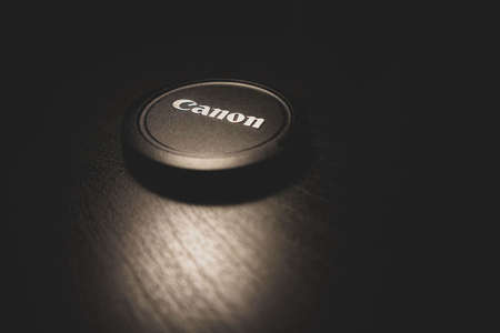 AURORA, CANADA - Nov 24, 2019: An image of a canon camera cover on a  table.のeditorial素材