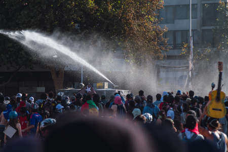 SANTIAGO, CHILE - Nov 28, 2019: The protests show their dissatisfaction with the Chilean government due to the social crisis that plagues President PiÃ±era and Chileのeditorial素材