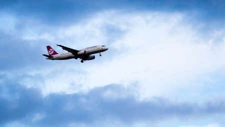 COPENHAGEN, DENMARK - Aug 12, 2012: Freebird Airlines approaching Copenhagen Airport Kastrup, CPH, summer 2012のeditorial素材