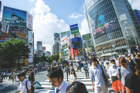 TOKYO, JAPAN - Sep 12, 2015: The famous Scramble Crossing in Shibuya, Tokyo during noon on a summer dayのeditorial素材