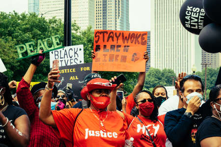 CHICAGO, UNITED STATES - Jun 19, 2020: Grant Park, Chicago-June 19, 2020: Community leaders and...