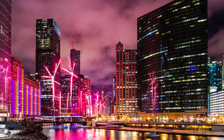 A beautiful timelapse shot of fireworks near the Chicago River at Wolf Point in Chicago, Illinois