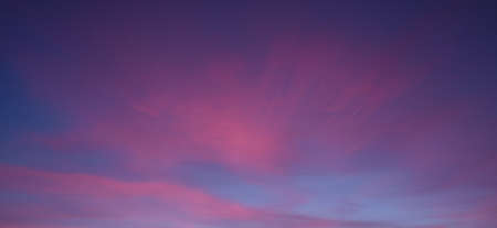 A low angle shot of the breathtaking colorful clouds in the skyの写真素材