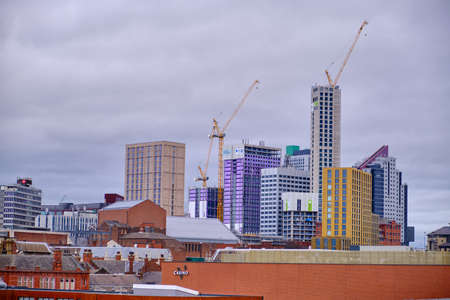 LEEDS, UNITED KINGDOM - Jan 11, 2020: Horizontal shot of leeds skyline on a cloudy day with new tall...