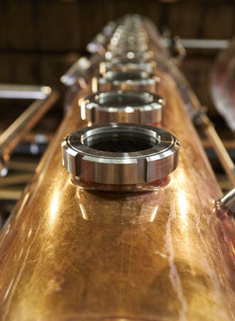 Column still for distilling spirits