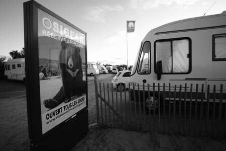 a camper van at the beach, life on the road in camper parks