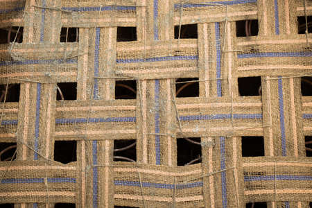 A closeup shot of blue and brown pieces of fabric made into squares perfect for a background