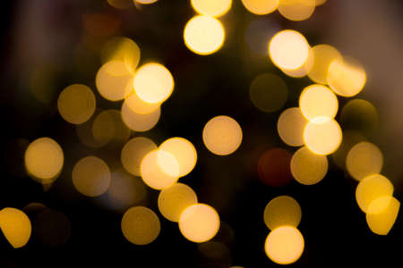 A beautiful shot of golden bokeh lights at night