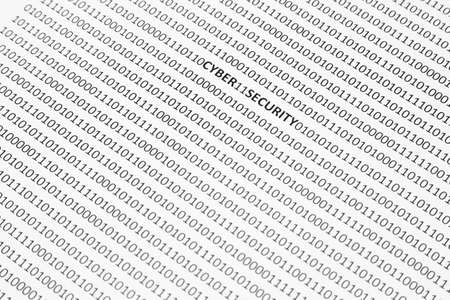 A closeup shot of a white surface with cyber security written in the middle of ones and zerosの写真素材