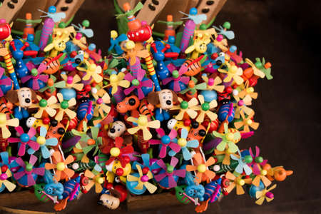 A closeup shot of small colorful toys with a dark background