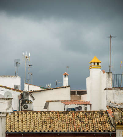 A wide angle shot of a white building under a cloudy skyの写真素材