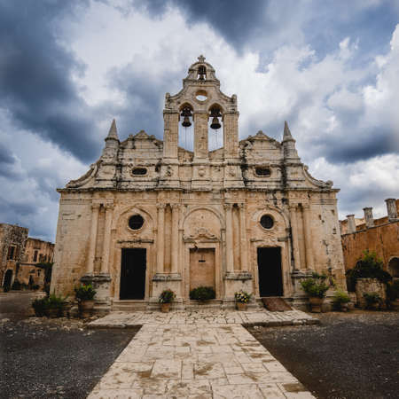 A low angle shot of the Monastery of Arkadi in Greece under a cloudy skyの写真素材
