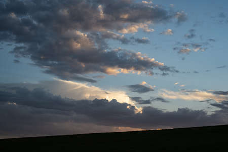 A beautiful scenery of colorful clouds in the sky during sunset - great for a cool background or...