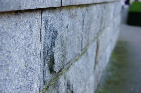 A closeup shot of a rock wall with a blurred backgroundの写真素材