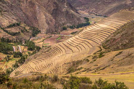 A high angle shot of the beautiful fields and mountains captured in Pisac, Peruの写真素材