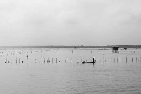 A scenery of lighthouses in the middle of the seaの写真素材