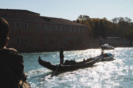 A boat on the water near buildings at Venice Italy Canals