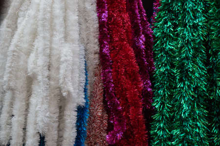 A closeup shot of colorful decorations for a Christmas treeの写真素材