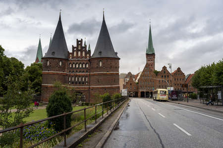LUBECK, GERMANY - Oct 06, 2018: The famous Holstentorplatz in LÃ¼beck, Germany under the cloudy...