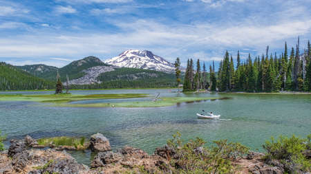 BEND, UNITED STATES - Jun 27, 2020: People Kayaking on Sparks Lake in the Cascade Mountains of Central Oregon.のeditorial素材