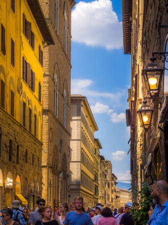 FLORENCE, ITALY - Jul 05, 2019: Street and old medieval houses at historic center of Florence, Tuscany, Italy. Florence is a popular tourist destination of Europeのeditorial素材